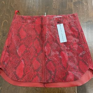 Red snake skin mini skirt
